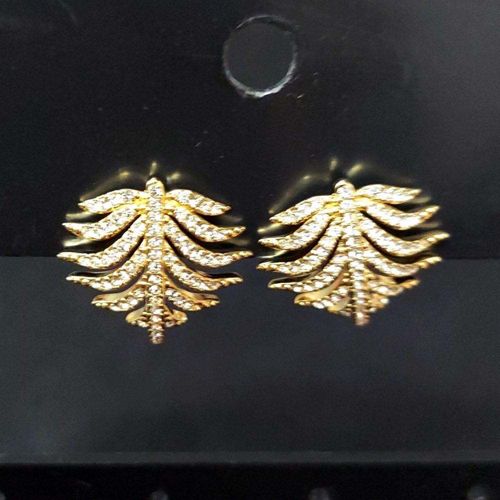 Gold tone earrings with bright shiny stones